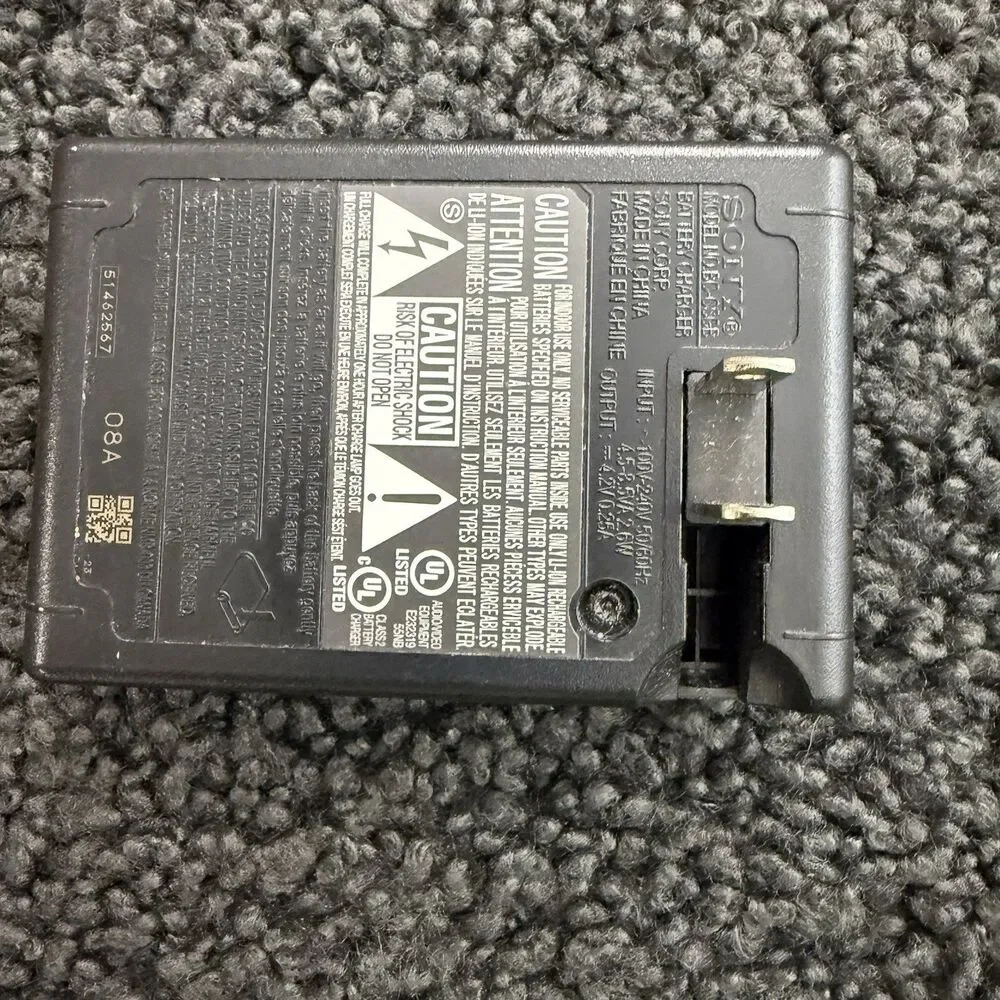 Sony BC-CSGB Battery Charger And SONY NP-BG1 And NP-FG1 Battery